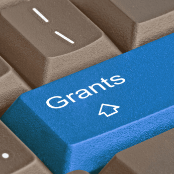photo of keyboard with the word Grants